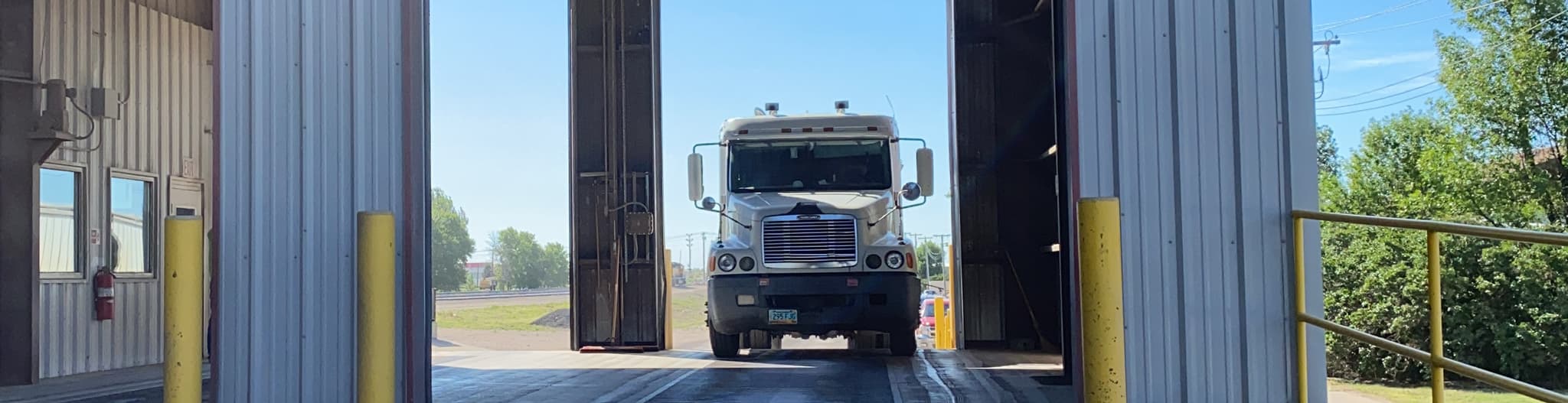 Truck driving into a garage