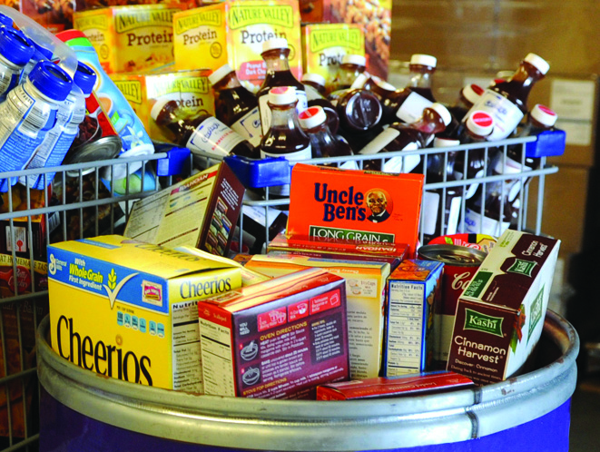 Dry pantry items piled in carts